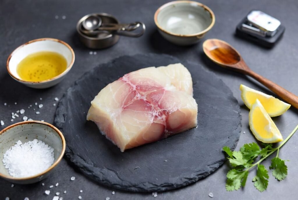 Fresh Catla fish fillet with ingredients illustrating protein and omega 3 nutrition facts